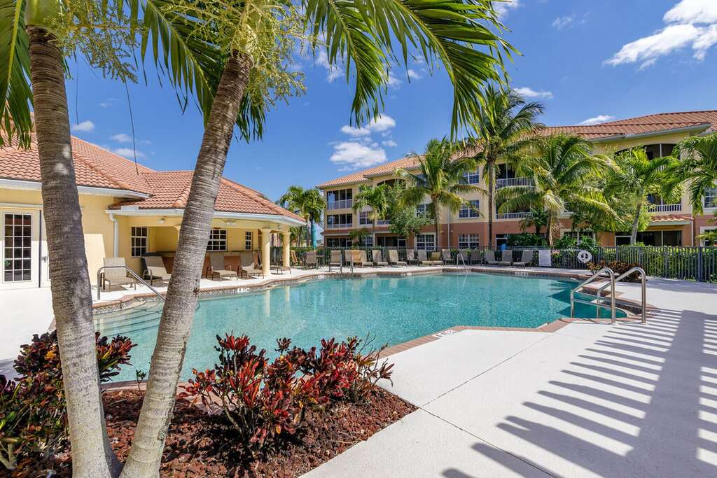 View of resort and resort pool in sunshine